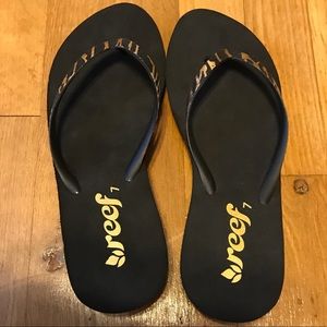 Reef Black and Gold Sandals